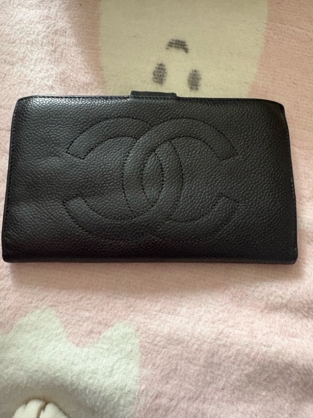 Black timeless caviar Leather Chanel wallet.